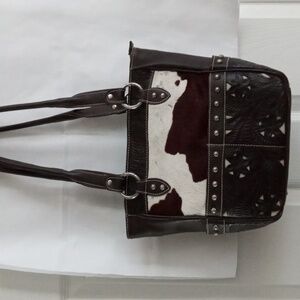 American West Handbag, tooled brown leather  with natural cow hide